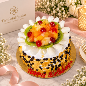 Fresh Fruit Birthday Cake - Fresh fruit birthday cake with kiwi, cherries, orange and white cream decoration