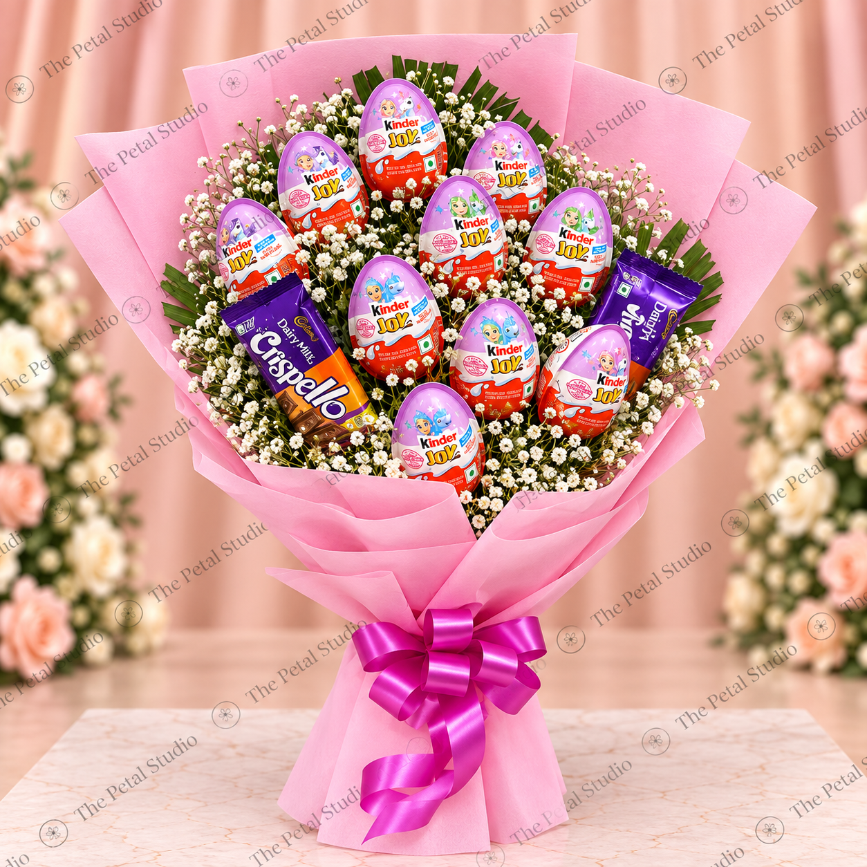 Kinder Joy and Dairy Milk Chocolate Bouquet - Kinder Joy and Dairy Milk chocolate bouquet with baby's breath in pink wrapping