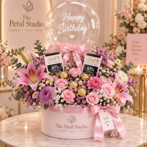 Luxury Pink Floral and Chocolate Birthday Hatbox - Luxury pink floral and chocolate birthday hatbox with lilies, roses, chrysanthemums, chocolates and Happy Birthday balloon
