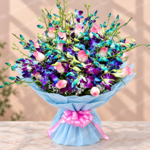 Blue and Purple Mixed Rose Orchid Bouquet - Mixed bouquet of pink roses and vibrant blue and purple orchids with blue wrapping and pink ribbon
