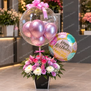 Pink Bubble Balloon Flower Arrangement - - Pink bubble balloon flower arrangement with roses and mixed pink flowers in a black round box
