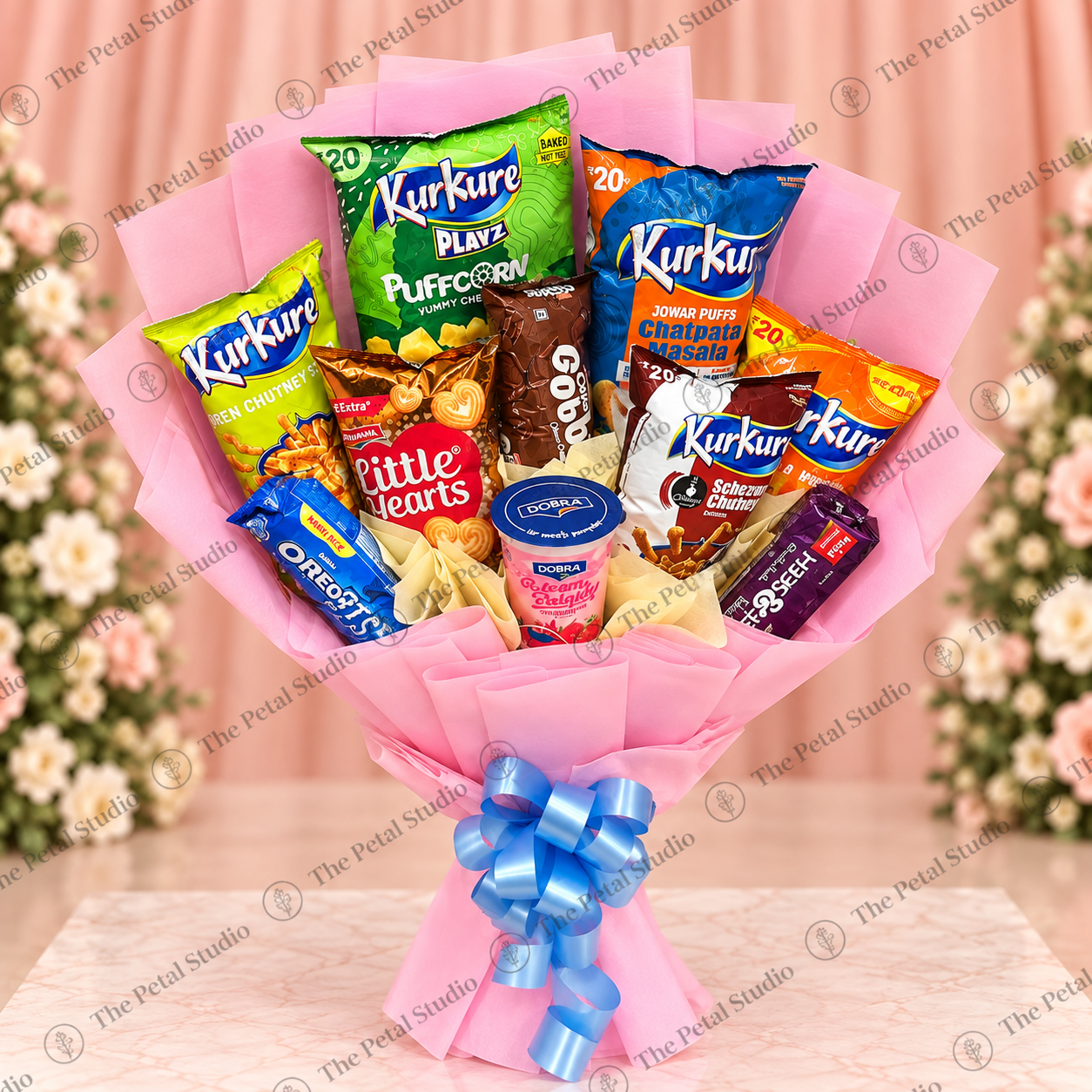 Pink Kurkure and Snack Bouquet - Pink Kurkure and assorted snack bouquet with chips biscuits and yogurt