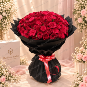 100 Red Rose Black Wrap Bouquet - 100 red rose bouquet wrapped in black paper with a pink satin ribbon